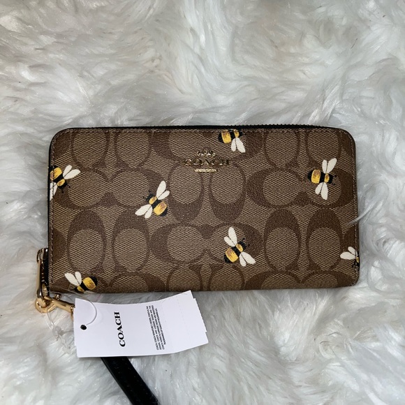 Coach Handbags - COACH Long Zip Around Wallet In Signature Canvas With Bee Print